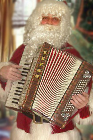  WUNDERLAND Weihnachtsmann mit Akkordeon